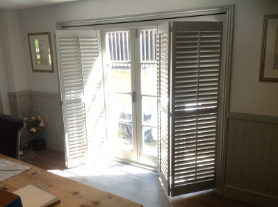 Track shutters for wide windows and doors